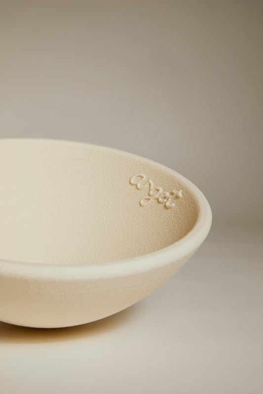 Beige curved bowl